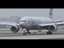 Note economy plus with darker headrests. Oneworld American Airlines Boeing 777 200er N796an Landing At Chicago O Hare Airport Youtube