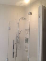 Multiple Finish Height Levels Mimics The Tile Set And Accents The Very Tall Unique Partial Wall A Shower Door Handles Bathroom Design Concepts Shower Doors