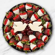 Showing you how to make chocolate covered strawberries arrangements like the ones sold by edible arrangements. Peace Doves Chocolate Strawberry Platter Edible Arrangements