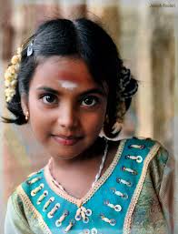 A photo that I made of a young girl in India several years ago that was  included in my photographic exhibitions of people in India. (permission to  photograph and exhibit)
