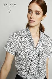 Jigsaw X Sj Low Tie Neck Button Through Blouse Black Leopard Simon Jersey Company Uniforms