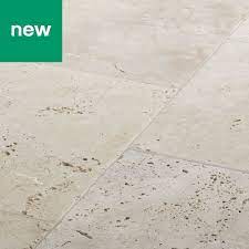 Tumbled white travertine floor tiles with their rough and unfilled surface can add a different textural dimension to your floors and interior decoration. Real Tumbled Travertine Cream Plain Natural Stone Floor Tile Pack Of 4 L 406mm W 406mm Natural Stone Tile Floor Tumbled Travertine Stone Flooring