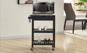 White portable kitchen island with storage, black granite top. Amazon Com Woodeem Microwave Carts Kitchen Carts With Storage And Drawers Rolling Island For Kitchen Small Kitchen Island On Wheels Black Furniture Decor