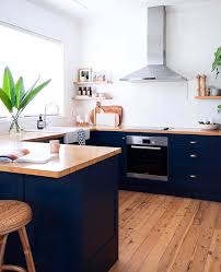 Forever A Sucker For Blue Cabinets Also Loving The Natural Wood Floors With The Butcher Block Dark Blue Kitchens Dark Blue Kitchen Cabinets Wood Floor Kitchen