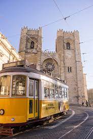 The windows of the tram are often opened when the weather is warm. A Ride On The 28 Tram Lisbon For 91 Days