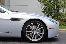 Image result for Titanium Silver 2011 Aston Martin