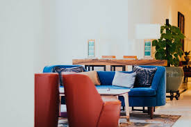 It's neutral which makes for a sound wall color choice because it works with many other colors that you might incorporate such as blue, orange, yellow, white, black, etc. 15 Stunning Living Room Ideas With A Blue Sofa For Unique Decor