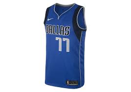 The signature is bold, and the jersey is missing a manufacturer's tag that has been torn off of the left front tail, two small holes above the number 77 on the back of the jersey, a small white stain above world on the chest, and. Dallas Mavericks Luka Doncic Jersey Cheap Buy Online