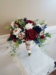 Check out our navy blue wedding bouquet selection for the very best in unique or custom, handmade pieces from our bouquets shops. Wedding Bouquet Wedding Flowers Medium Navy Blue Ivory Rose Garden Stem Bridal Bouquet Bouquets Bouquets Corsages
