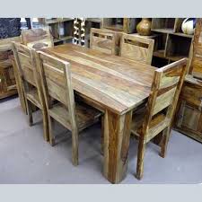 A transitional dining collection featuring solid wood grains and clean lines for a bold presence in your dining space. Kota Sheesham Dining Table And Four Chairs Jugs Furniture
