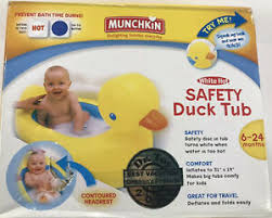 Blowing bubbles, butterflies, flowers, clouds, sunshine and rubber duck. Munchkin Duck Inflatable Tub White Hot Indicator 31 X 19 Baby Bath 6 24 Month Ebay