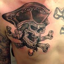 It kind of reminds us of insignia that would be inscribed on a treasure chest. 8 Daring Pirate Skull Tattoos Tattoodo