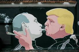 Revamped Trump-Putin graffiti in ...