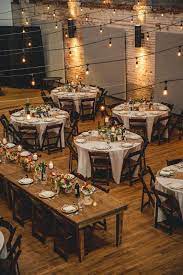Rustic Wedding Reception Decor Idea Wooden Tables With Cream Table Linens Ed Wedding Reception Layout Wedding Reception Tables Layout Wedding Table Layouts