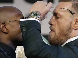 FOTO: Aksi Panggung Floyd Mayweather Jr. dan Conor McGregor