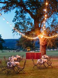 Italian Bistro Lighting Leads The Way To Our Wood Slab Bar Bistro Lights Wedding Wedding Lights Lights Wedding Decor