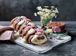 Both are giant chocolate sponge rolls filled with chocolate buttercream and covered in milk chocolate. M S Launches New Version Of Colin The Caterpillar Just In Time For Easter The Independent