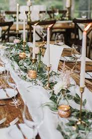 Wedding Greenery Table Decorations Olive Leaves Candles Sarah Canning Winter Wedding Table Wedding Centerpieces Wedding Table