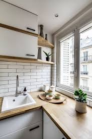Appartement Paris 8 Un 38 M2 Refait A Neuf Par Un Archi D Interieur Cuisine Appartement Amenagement Petite Cuisine Cuisine Blanche Et Bois