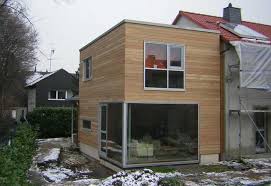 Holzanbau Energetische Sanierung Eines Reihenhauses Eines Energetische Holzanbau Moderneranbau Reihenhause In 2020 Holzanbau Anbau Haus Energetische Sanierung