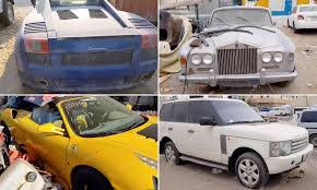 On average, police in dubai recover around 3,000 abandoned luxury cars every year. The Supercar Scrapyard Ferraris Rolls Royces And Lamborghinis Lie Covered In Desert Dust In Dubai Daily Mail Online