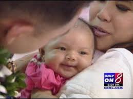 Local sailor meets his first baby for first time