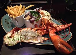 Choose any cut of red meat and pair it with a seafood choice such as: Steak And Lobster Restaurant London