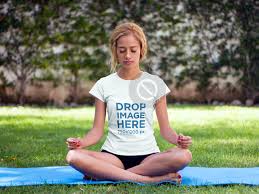 Placeit T Shirt Mockup Of A Woman Practicing Yoga At A Park New T Shirt Design Women Shirt Mockup
