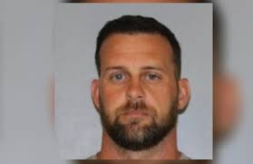 2 charges added for West Hall Middle School teacher