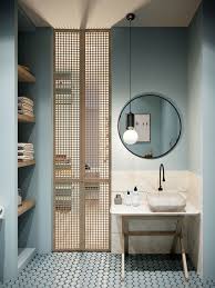 Salle De Bain Bleu Avec Porte En Bois Ajouree Simple Bathroom Bathroom Interior Bathroom Inspiration