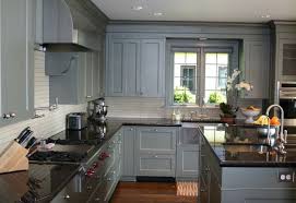 grey kitchen cabinets with black