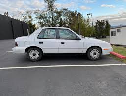 Image result for Bright White 1993 Plymouth