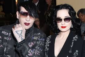 Brian hugh warner (born january 5, 1969), known professionally as marilyn manson, is an american singer, songwriter, record producer, actor, painter, and writer. Marilyn Manson Cosies Up With Ex Wife Dita Von Teese 13 Years After Divorce Mirror Online