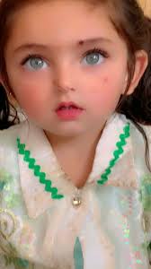 Adorable Twin Babies Playing with Twin Dolls