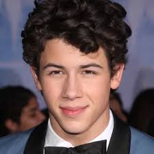 She looks pretty and stylish in this haircut. Famous Men With Curly Hair A Photo Slideshow