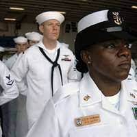 Culinary Specialist 2nd Class Bryan Ventura, assigned to the amphibious  assault ship USS Makin Island (LHD 8), checks inventory of a pallet during  a stores