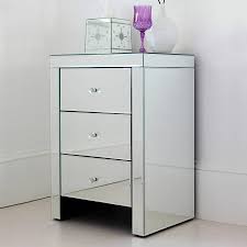 This bedside cabinet will add elegant style to your boudoir with a contemporary twist. Three Drawer Mirrored Bedside Table By Out There Interiors Notonthehighstreet Com