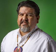 Chehalis Tribal Members. Charlotte Lopez with ICC 100 medal for 36th place  and Warren Beckwith, Land Descriptions Instructor