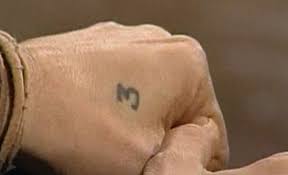 3 Between The Thumb And The Index Finger Of His Left Hand Johnny Depp Has The Number 3 According To Johnny Number Tattoos Tattoos Triangle Tattoo Meaning