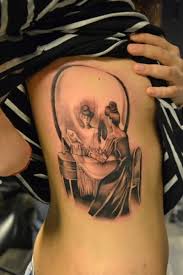 He took a lot of time designing the perfect tattoo. Side Skull Mirror Tattoo By Crazy Needle