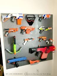 Novice nerf wall builders often make the mistake of aligning their blasters in random directions relative to each other. Diy Nerf Gun Storage Rack The Handyman S Daughter
