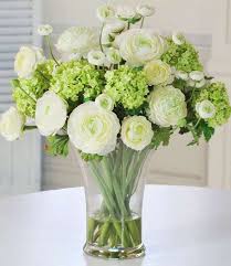Perfect to for displaying on a. Ranunculus Floral Arrangement With Glass Vase Frontgate Artificial Flower Arrangements Floral Arrangements Silk Flower Arrangements