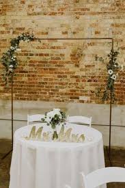Sweetheart Table Idea Simple Sweetheart Table With Copper And Greenery Arch Wedding Expecta Sweetheart Table Sweetheart Table Decor Sweetheart Table Wedding