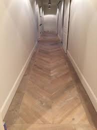 15 Creative Combinations Hardwood And Marble For Gorgeous Floor Homiku Com Wood Floor Design Herringbone Wooden Floors Herringbone Wood Floor
