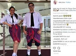 She wants to be a woman who performs well than men. Lungi Dance Meets Steel Frame Ias Toppers Tina Dabi And Her Husband Have A Blast See Photos Trending Viral News