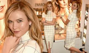 Karlie Kloss wears a chic fitted two-piece in London ahead of British  Fashion Awards