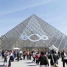 Image result for Macron in front of Mitterand's pyramid