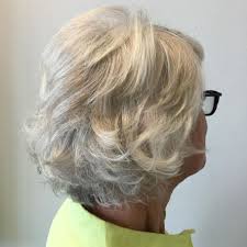 The dark grey hair color is present throughout the hair, except for the frontal strands that are lighter grey. 60 Best Hairstyles And Haircuts For Women Over 60 To Suit Any Taste Cool Hairstyles Womens Haircuts Thick Hair Styles