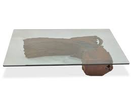 A metal crisscross base is visually appealing and creates a sturdy look. Salvaged Wood And Square Glass Top Coffee Table By Rotsen Furniture In Coffee Tables