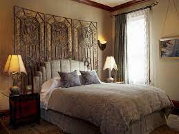 With paint, wallpaper, stencils, wall art, pictures and so on. Dress Up Your Walls With Fabric Hgtv